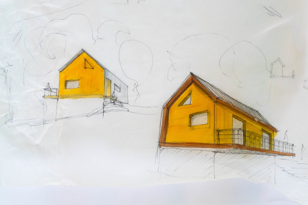白纸上画了两座黄色的房子